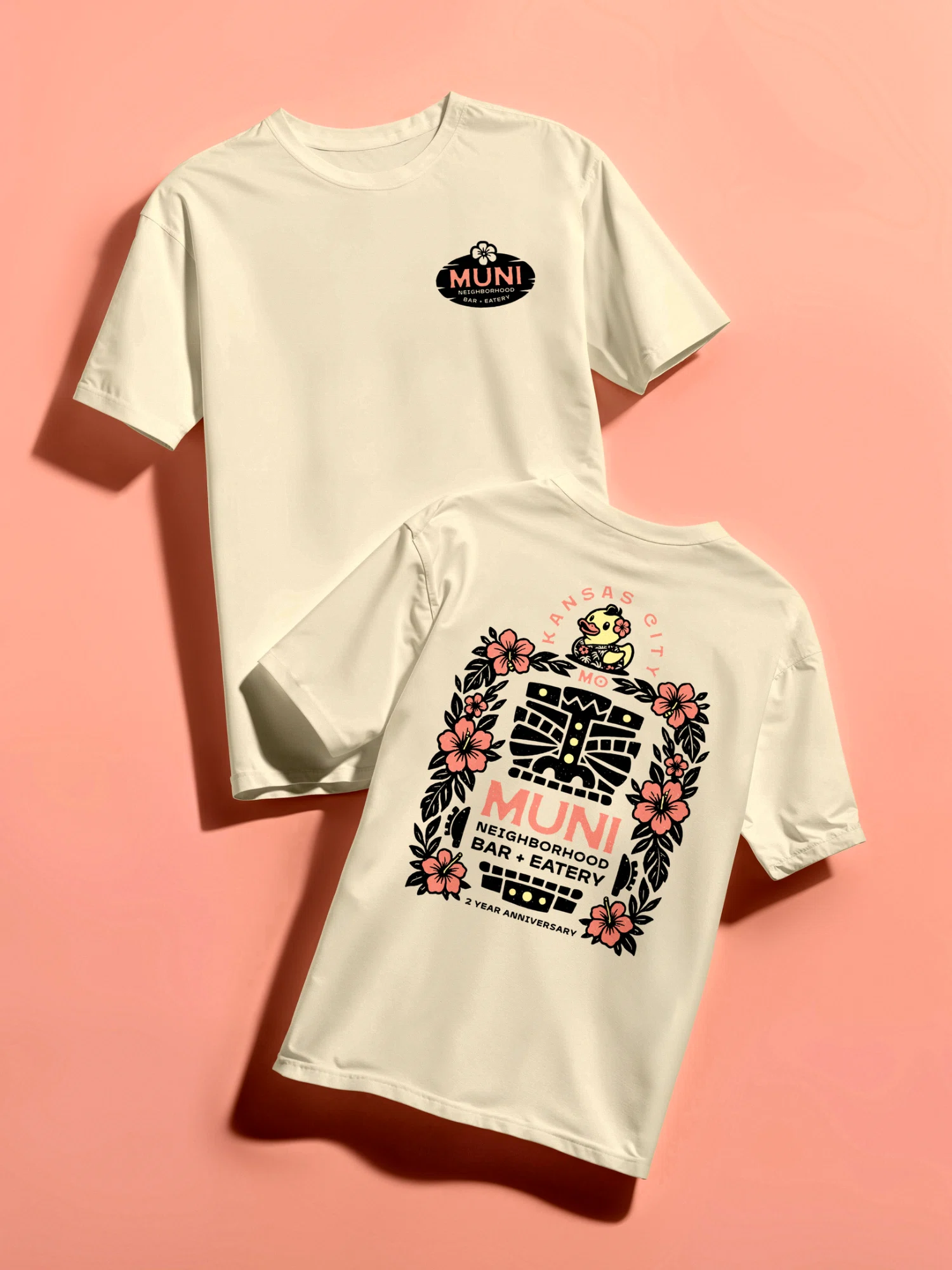 MUNI two-year anniversary cream T-shirts on coral background