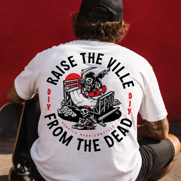 The Ville Raise the Ville from the Dead white T-shirt on skateboarder