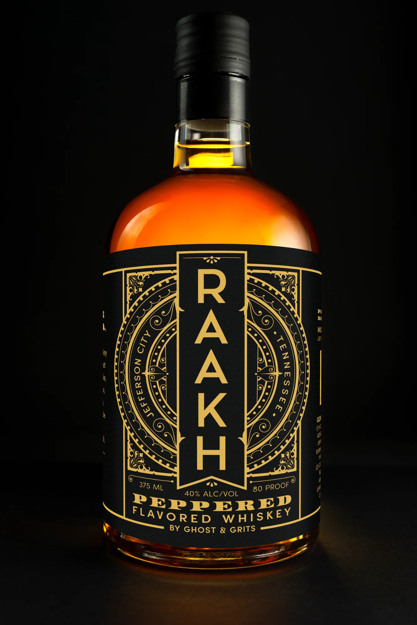 RAAKH Peppered Flavored Whiskey bottle