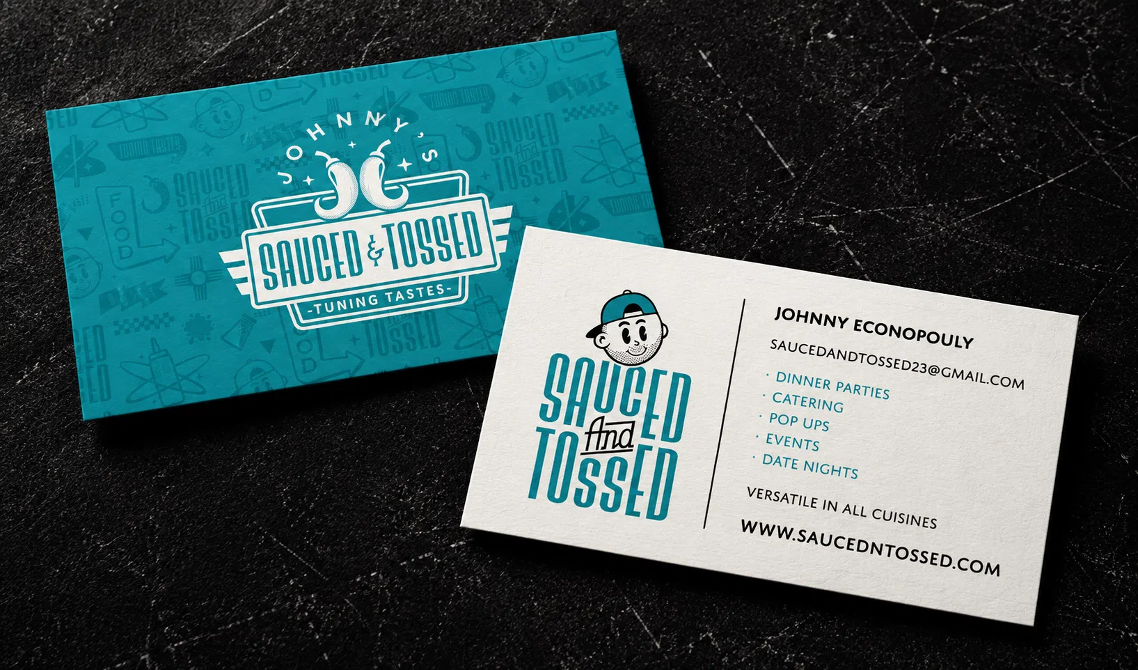 Sauced & Tossed business cards shown in a realistic studio mockup